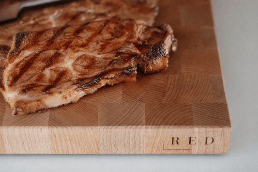 Waarom een kopshouten snijplank de beste keuze is voor BBQ en vlees